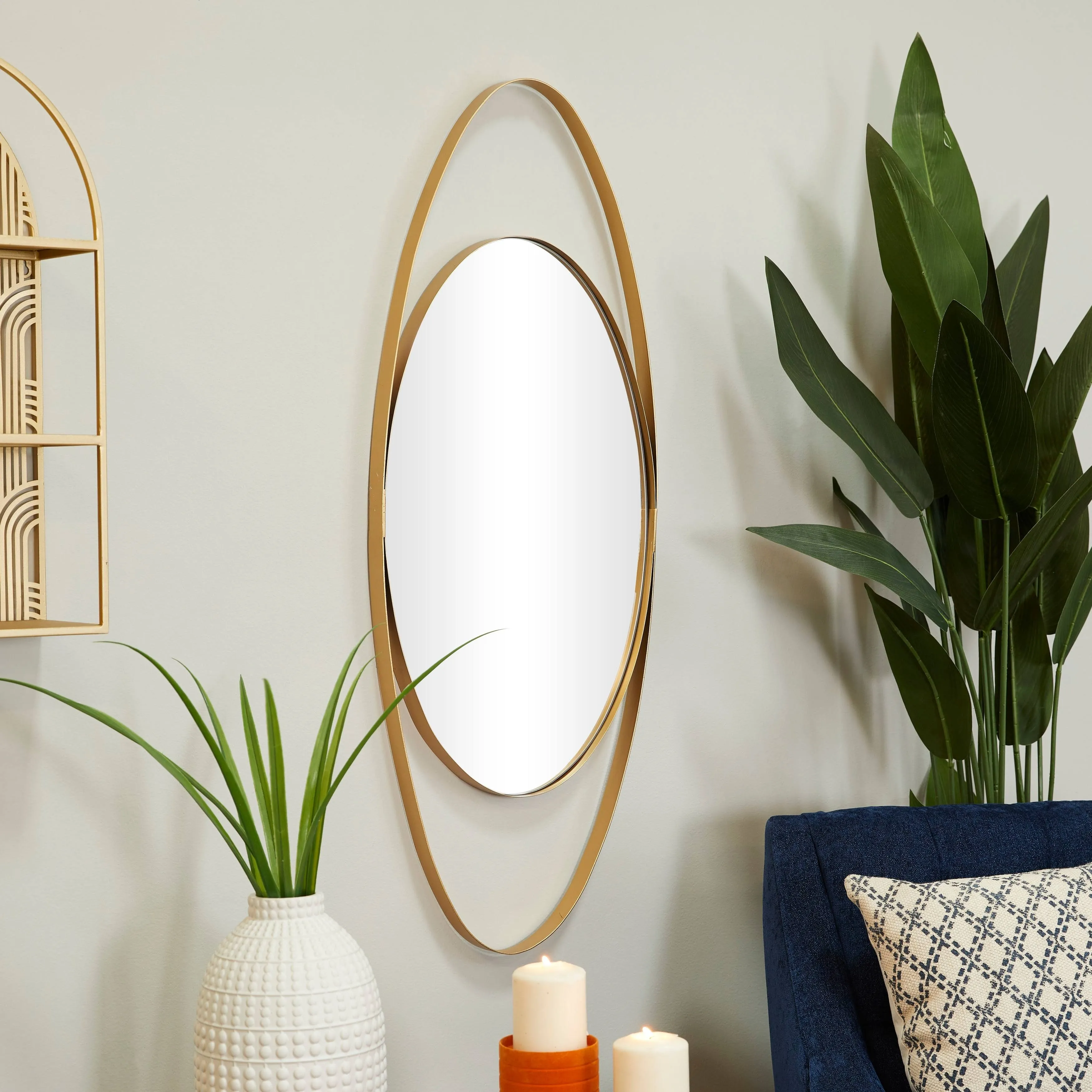 CosmoLiving by Cosmopolitan Metal Oval Wall Mirror - Black or Gold